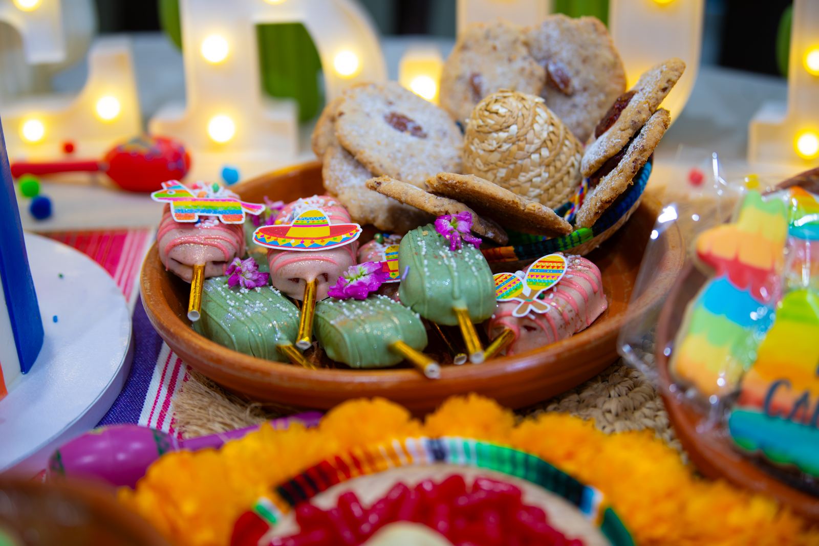 Colorful fiesta dessert spread with traditional treats