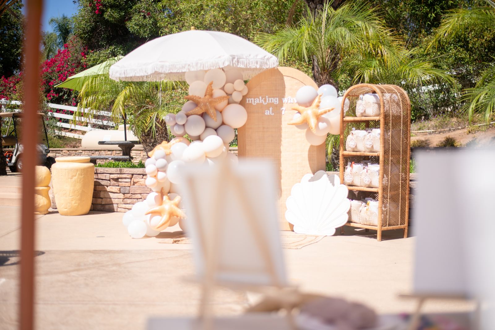 Cabana lounge seating with umbrellas styled poolside