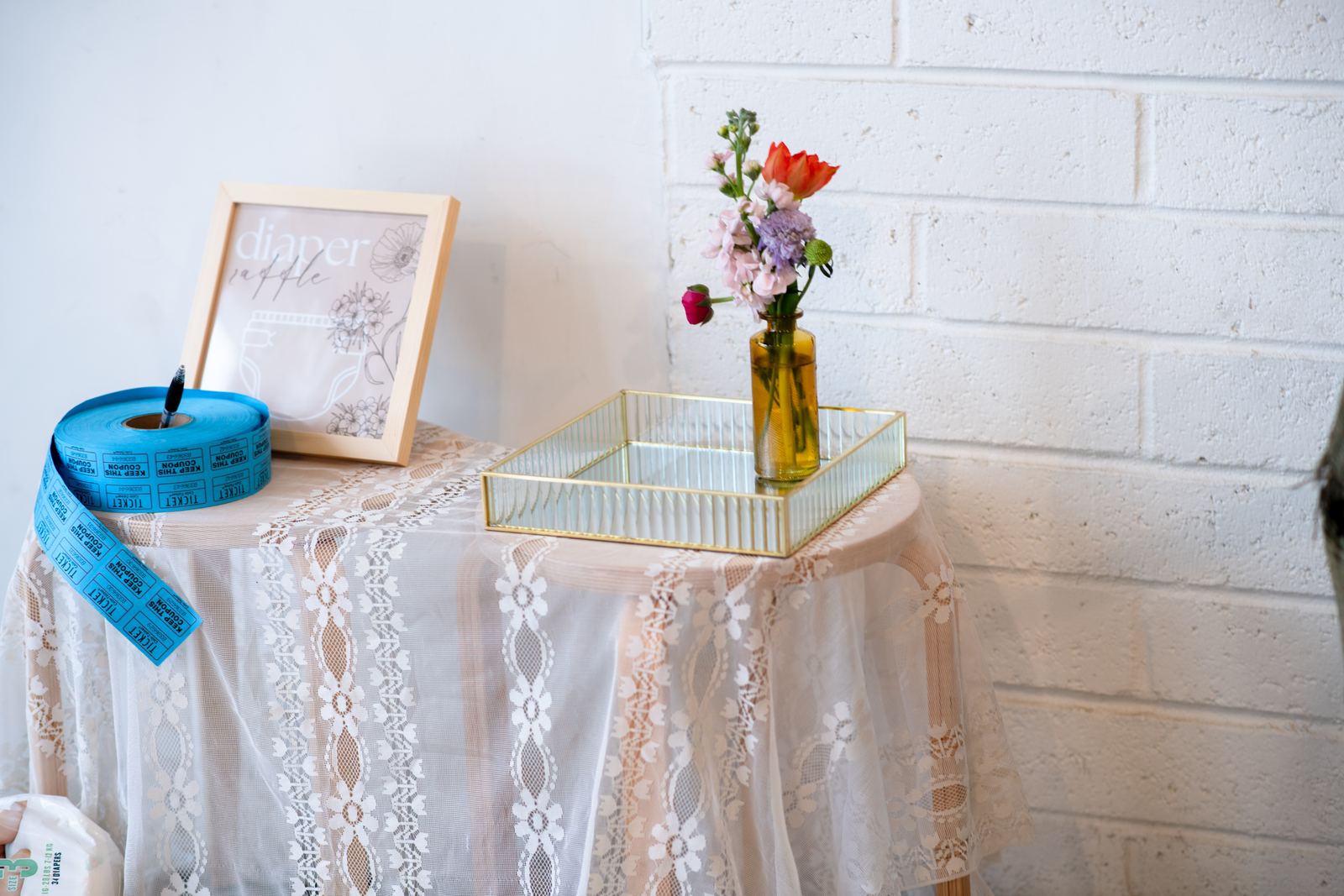 Bloom bar table with lace linen and fresh stems