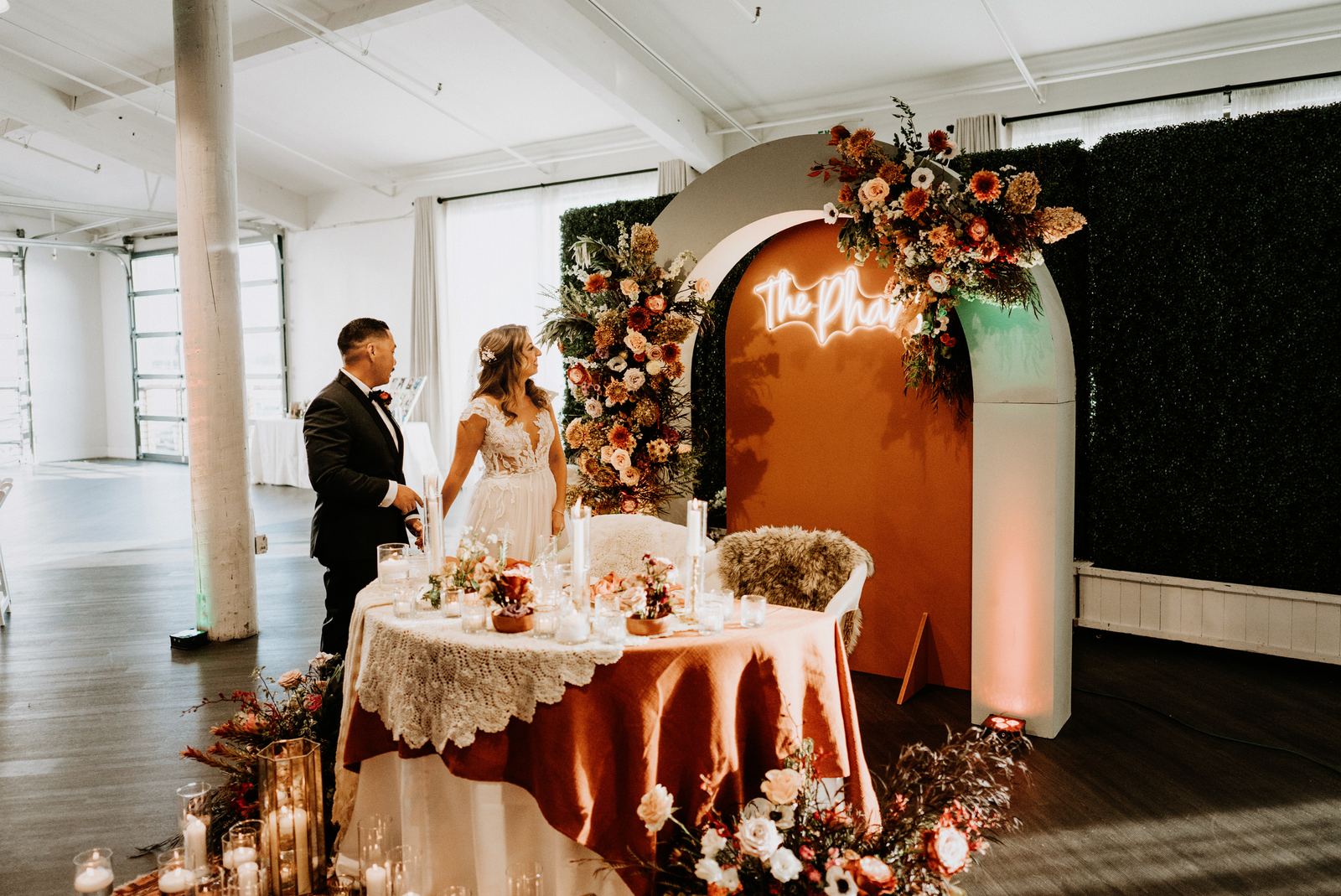 Bride and groom in a styled reception room