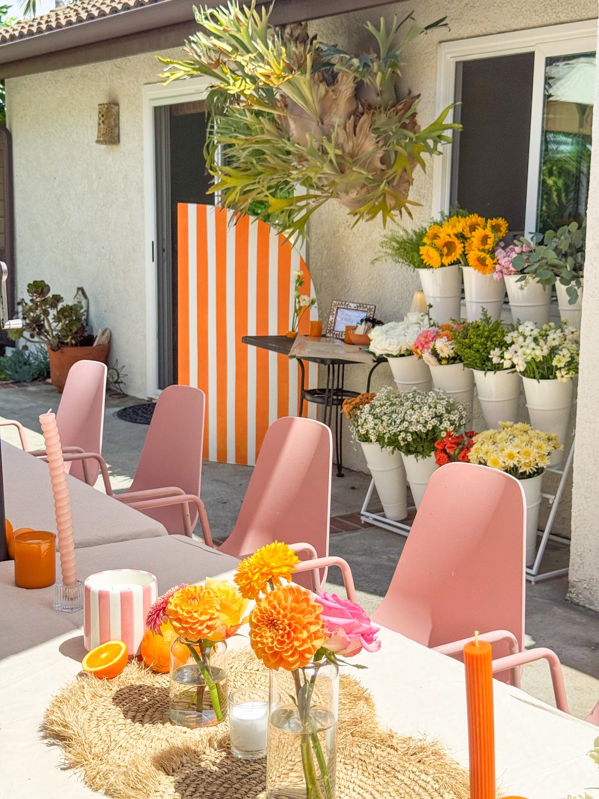Patio flower market with buckets of fresh blooms