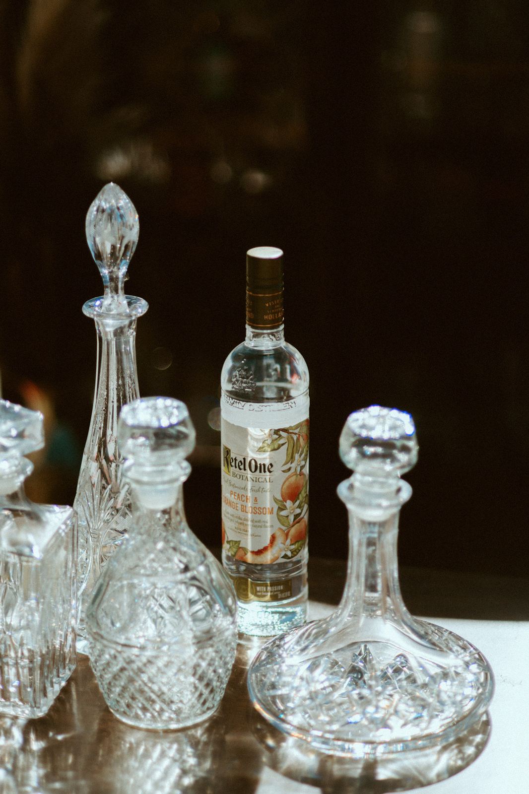 Vintage crystal decanters styled on the bar