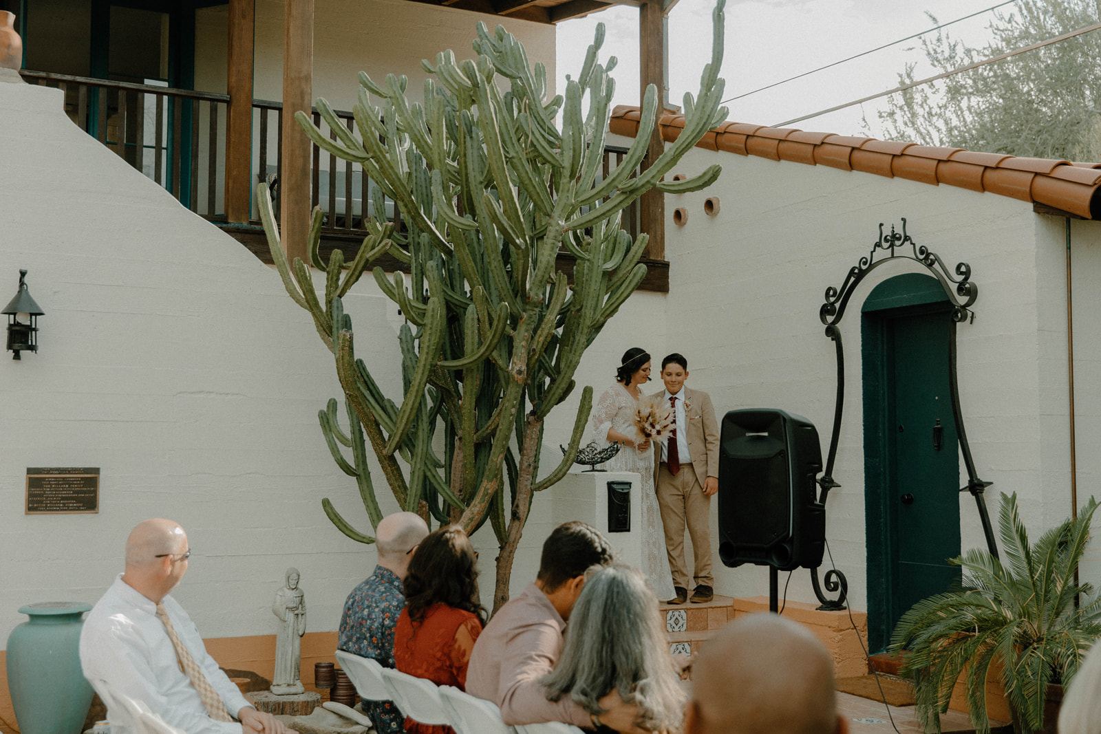 Courtyard wedding ceremony among cactus gardens