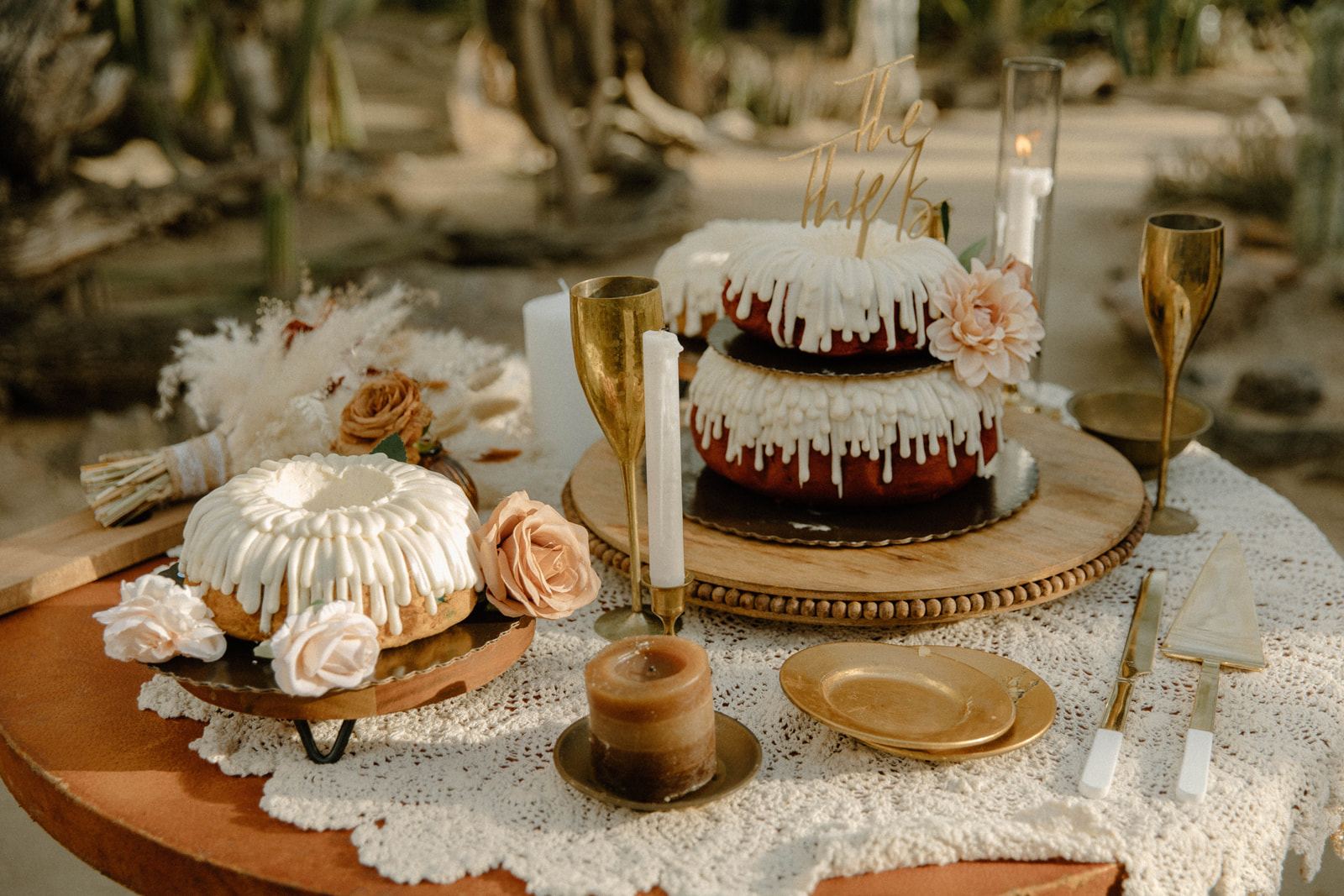 Cake table with lace linen in a cactus garden