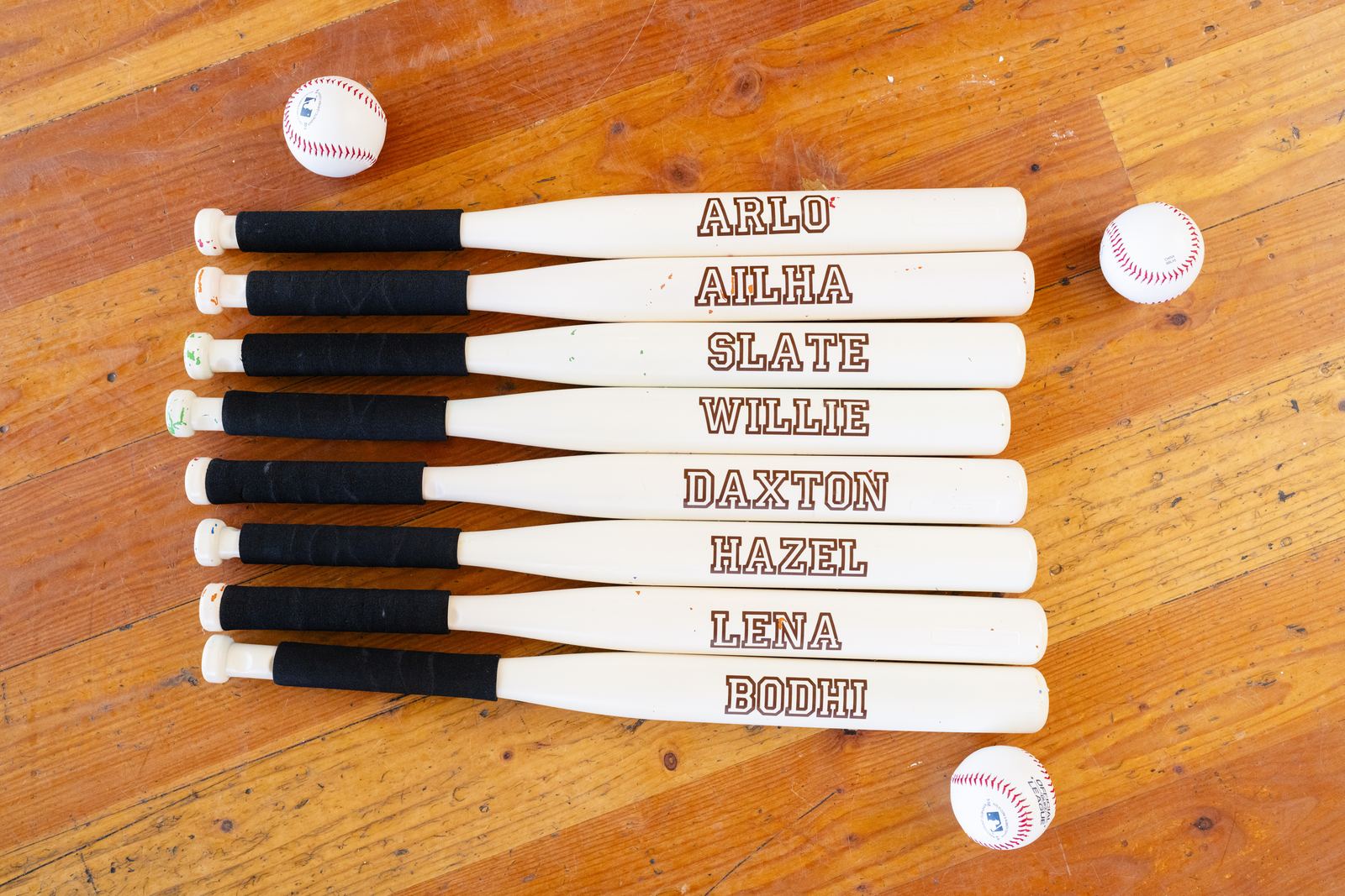 Personalized mini baseball bats as party favors