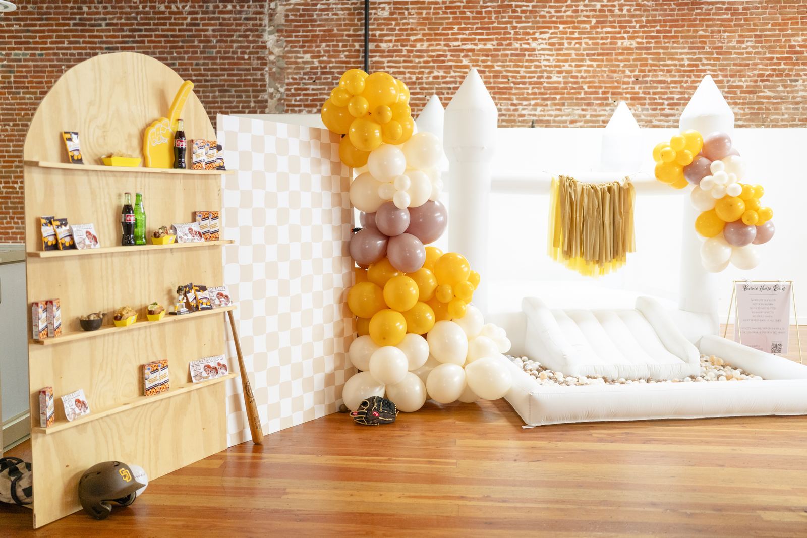 Kids party table with baseball details and yellow chairs